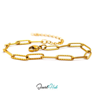 Patterned gold paperclip chain bracelet in stainless steel with milled ridged texture on every link - JewelHub