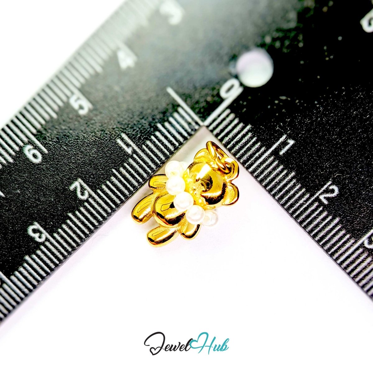 Gold Pearl Collar Bear charm measured against a ruler at 12mm wide by 20mm tall - JewelHub