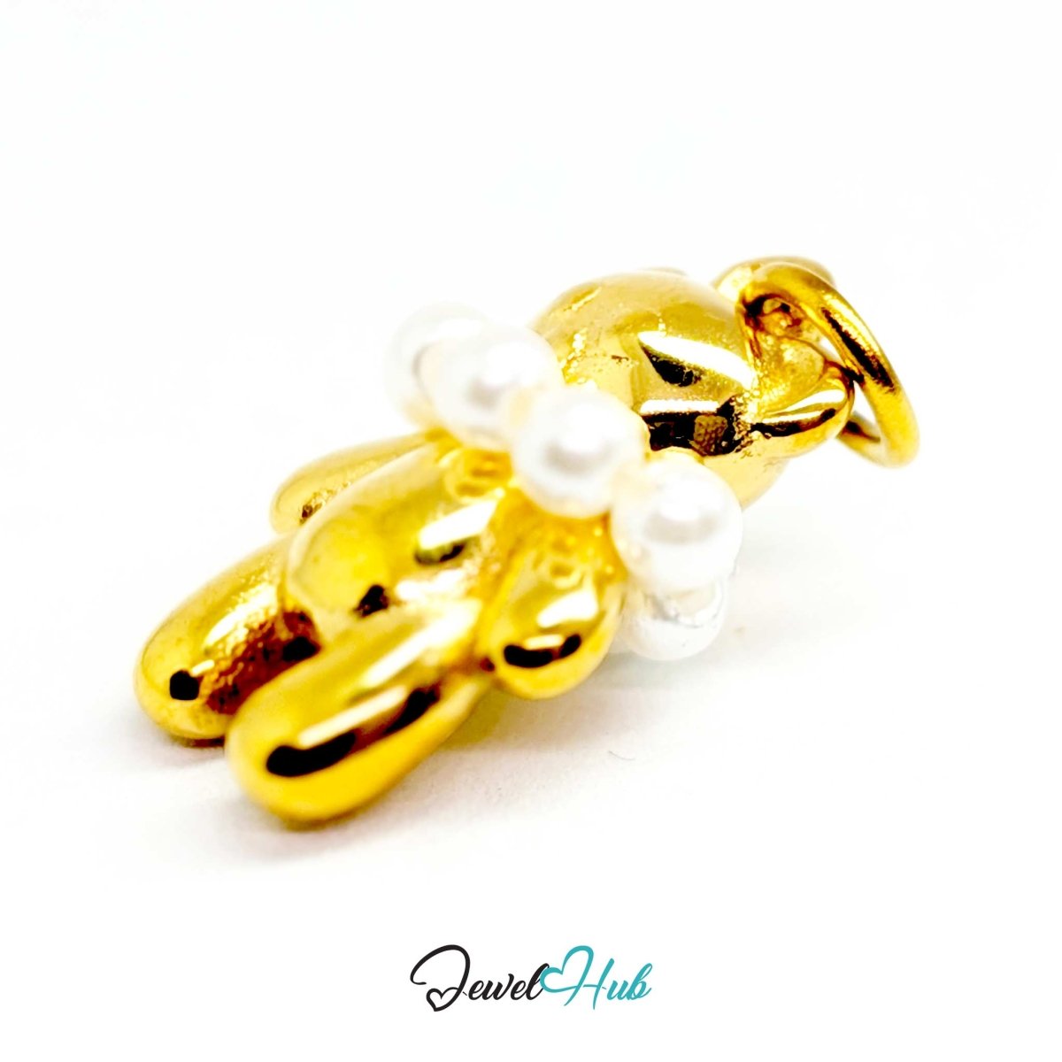 Angled view of the gold Pearl Collar Bear charm catching the light across the pearl collar - JewelHub
