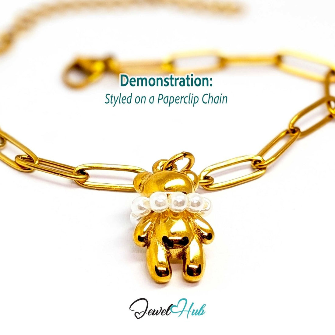 Gold pearl Collar Bear charm styled on a gold paperclip chain bracelet - JewelHub