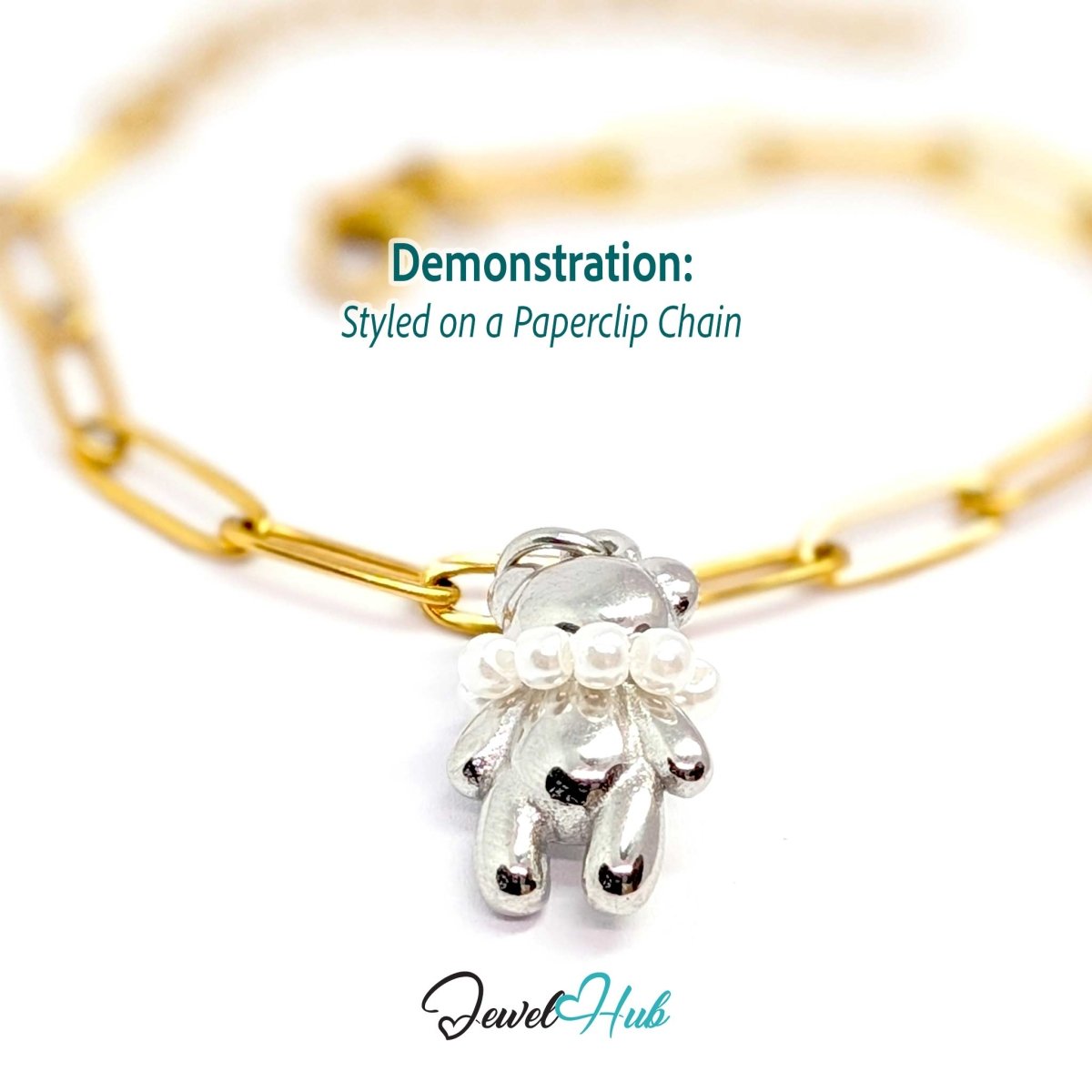 Silver pearl Collar Bear charm styled on a gold paperclip chain bracelet for a two-tone look - JewelHub