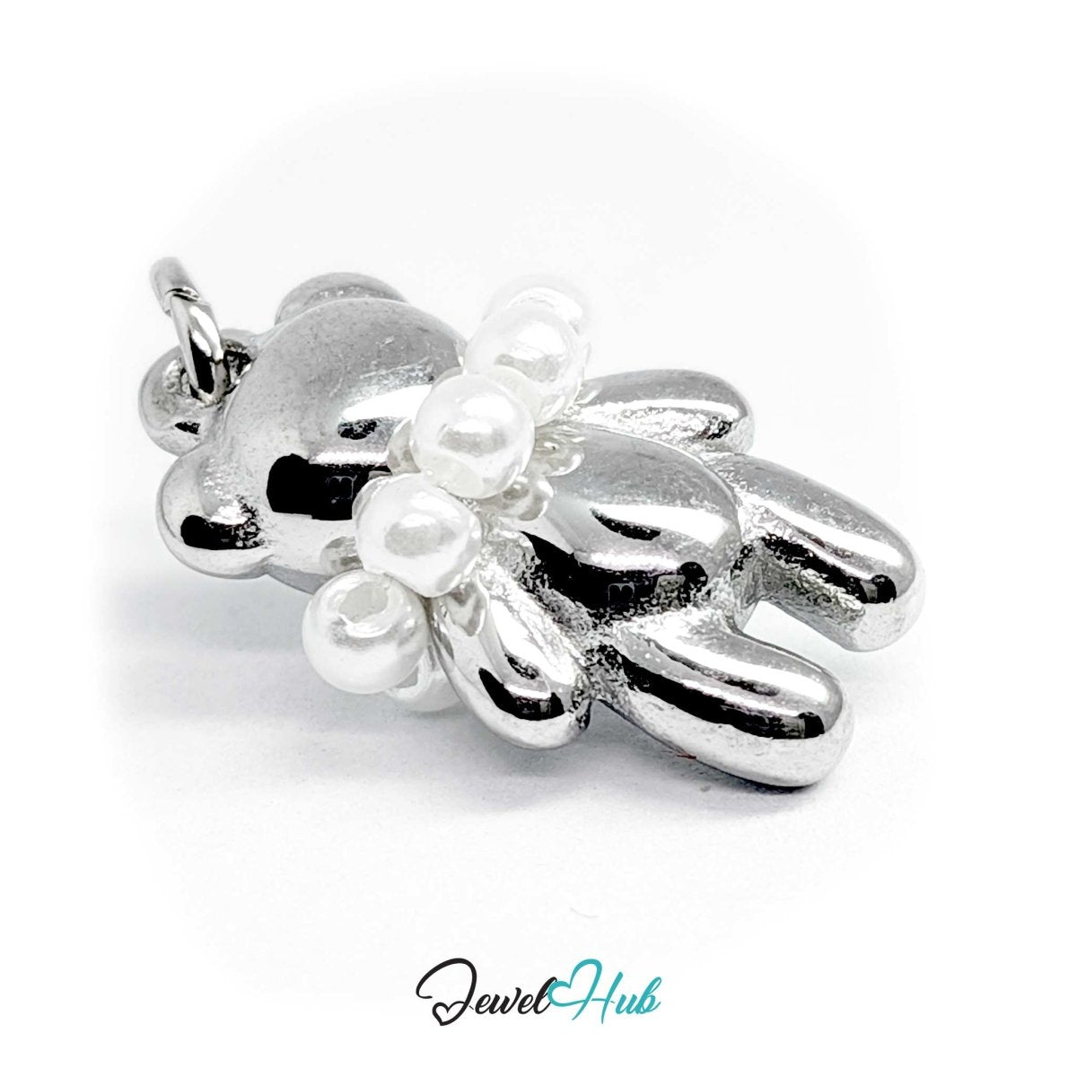 Angled view of the silver Pearl Collar Bear charm catching the light across the pearl collar - JewelHub
