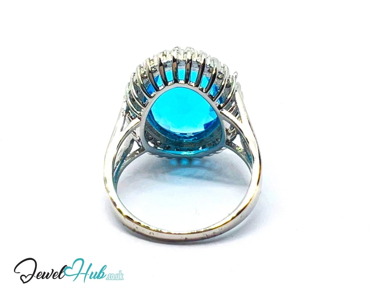 Radiant Regal Ring 🔱 Premium Copper · Silver Plated · Over - Cut Center Stone · Halo Zirconia Detail - JewelHub.co.uk