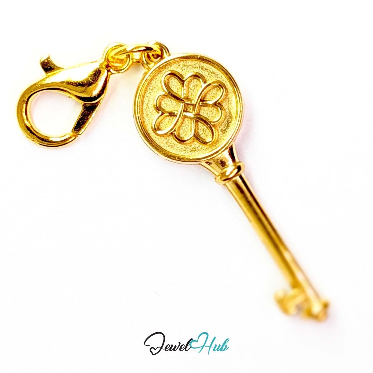Round openwork key charm in gold stainless steel - shown with the lobster clasp attached - JewelHub