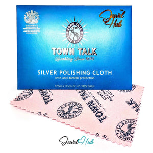 A blue Town Talk polishing cloth box placed above a pink polishing cloth with black printed branding, on a white background. The Jewel Hub logo appears at the top right and bottom center.