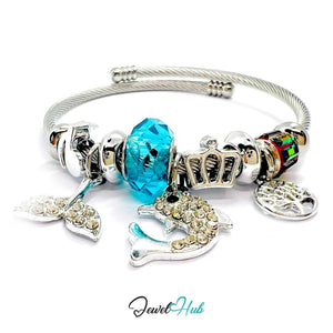 Silver Stainless Steel Cyan Whale, Fishtail & Tree Charm Bangle - JewelHub.co.uk