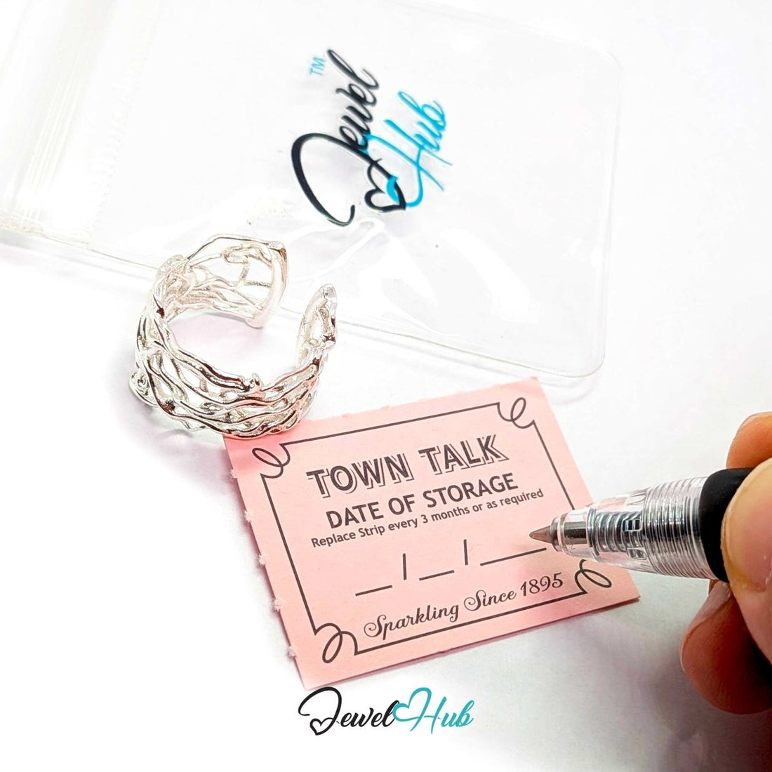 Jewel Hub Town Talk Silver Storage Strips set, showing a blue box of 36 pink storage strips arranged in a grid below on a white background.