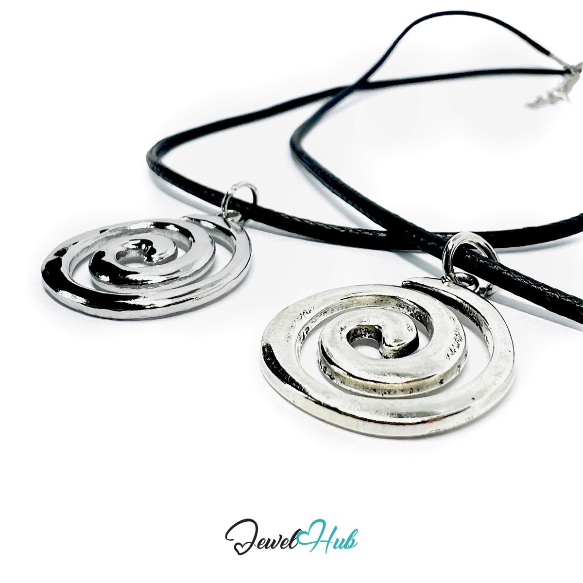 Spiral Charm Material Comparison — Titanium Steel vs Zinc Alloy - JewelHub.co.uk