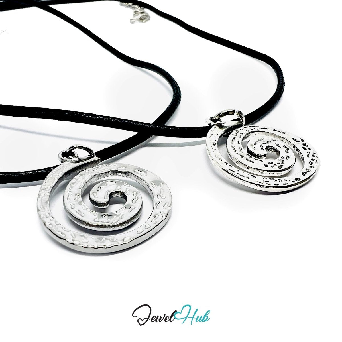 Spiral Charm Material Comparison — Titanium Steel vs Zinc Alloy - JewelHub.co.uk