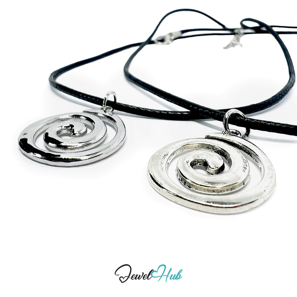 Spiral Charm Material Comparison — Titanium Steel vs Zinc Alloy - JewelHub.co.uk