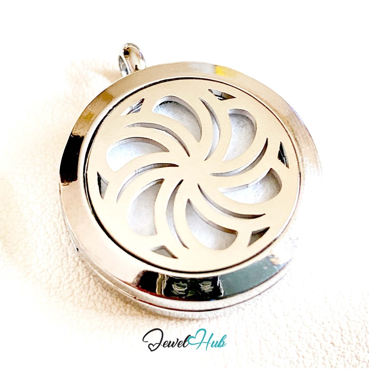 Stainless Steel Aromatherapy Pendant – Laced Bloom Heart for Compassion - JewelHub.co.uk