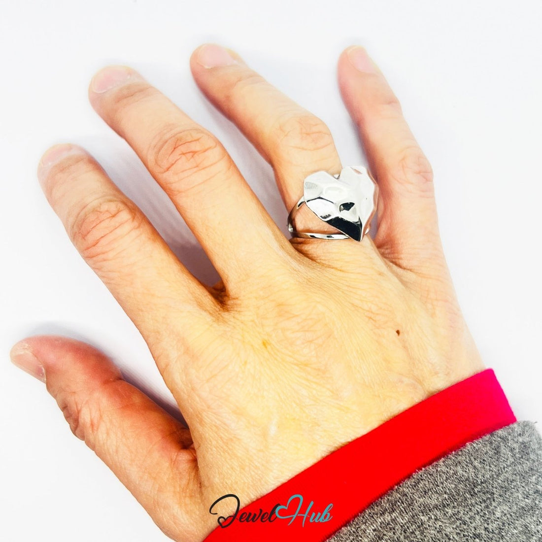 Silver heart-shaped charm on a white background with 'Jewel Hub' branding.