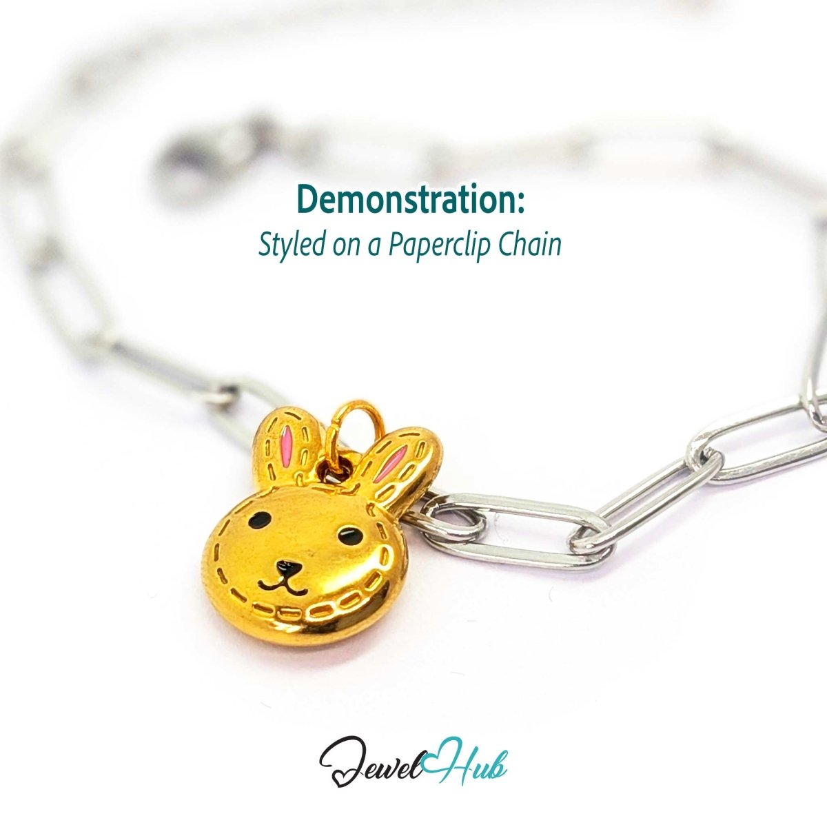 Gold stitched Bunny Head charm styled on a silver paperclip chain bracelet for a two-tone look - JewelHub