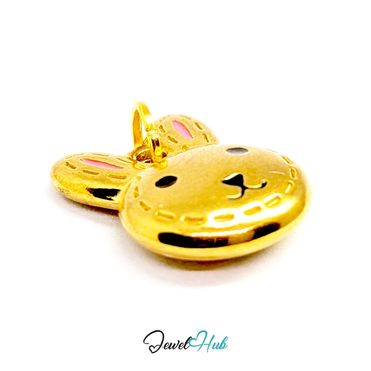 Gold Stitched Bunny Head charm seen from the side, showing the jump ring at the top - JewelHub