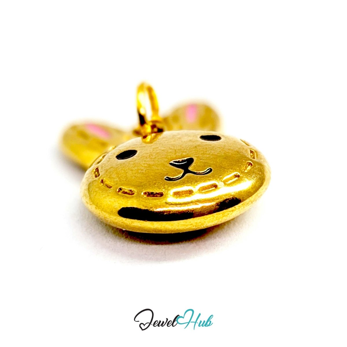 Close-up of the pink enamel ear linings and engraved nose on the gold bunny head charm - JewelHub