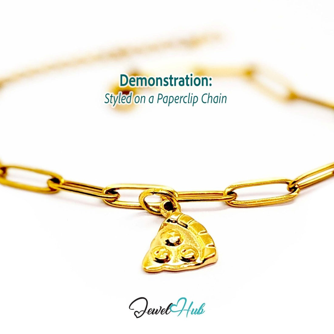 Three topping pizza slice charm in gold stainless steel - styled on a gold paperclip chain bracelet - JewelHub