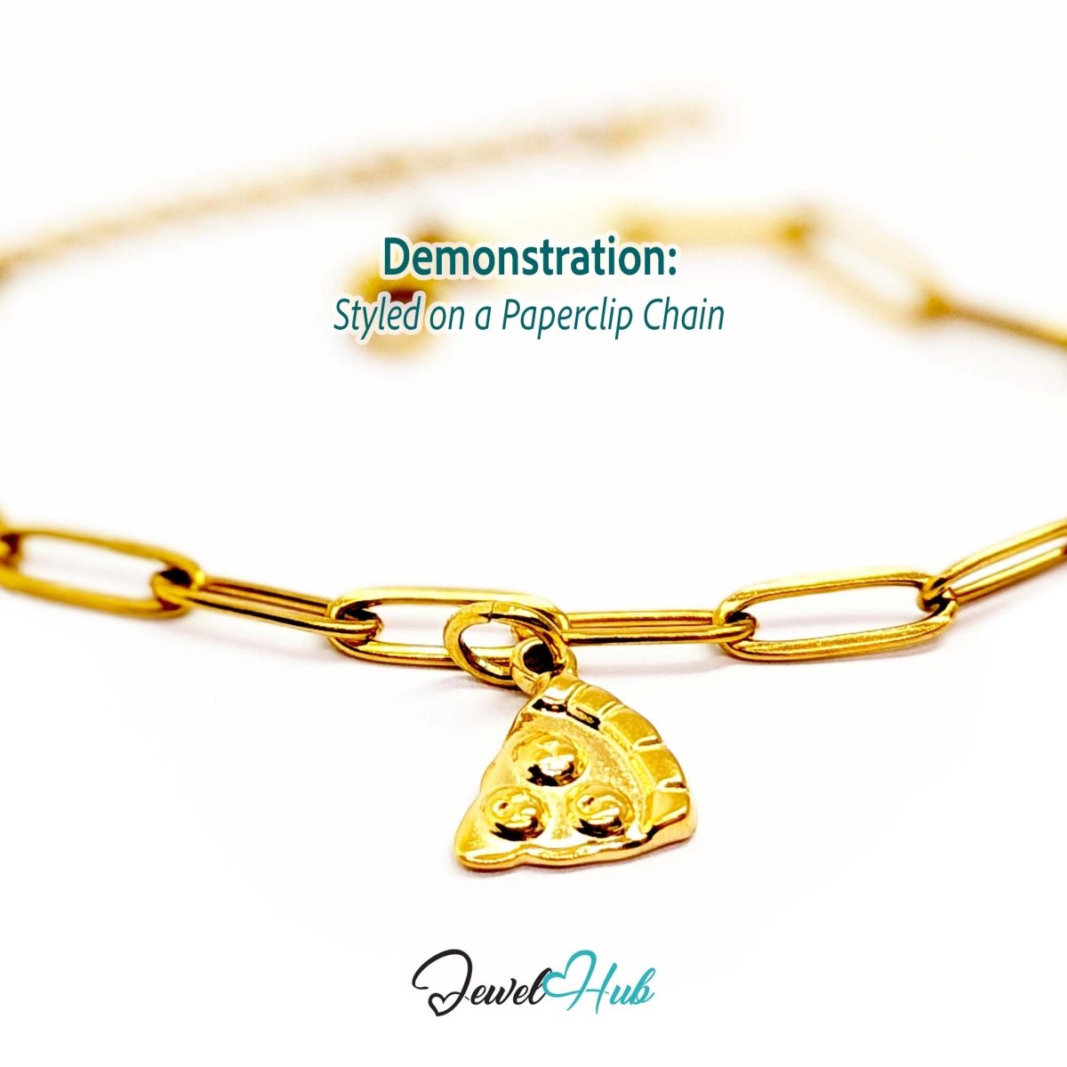Three topping pizza slice charm in gold stainless steel - styled on a gold paperclip chain bracelet - JewelHub