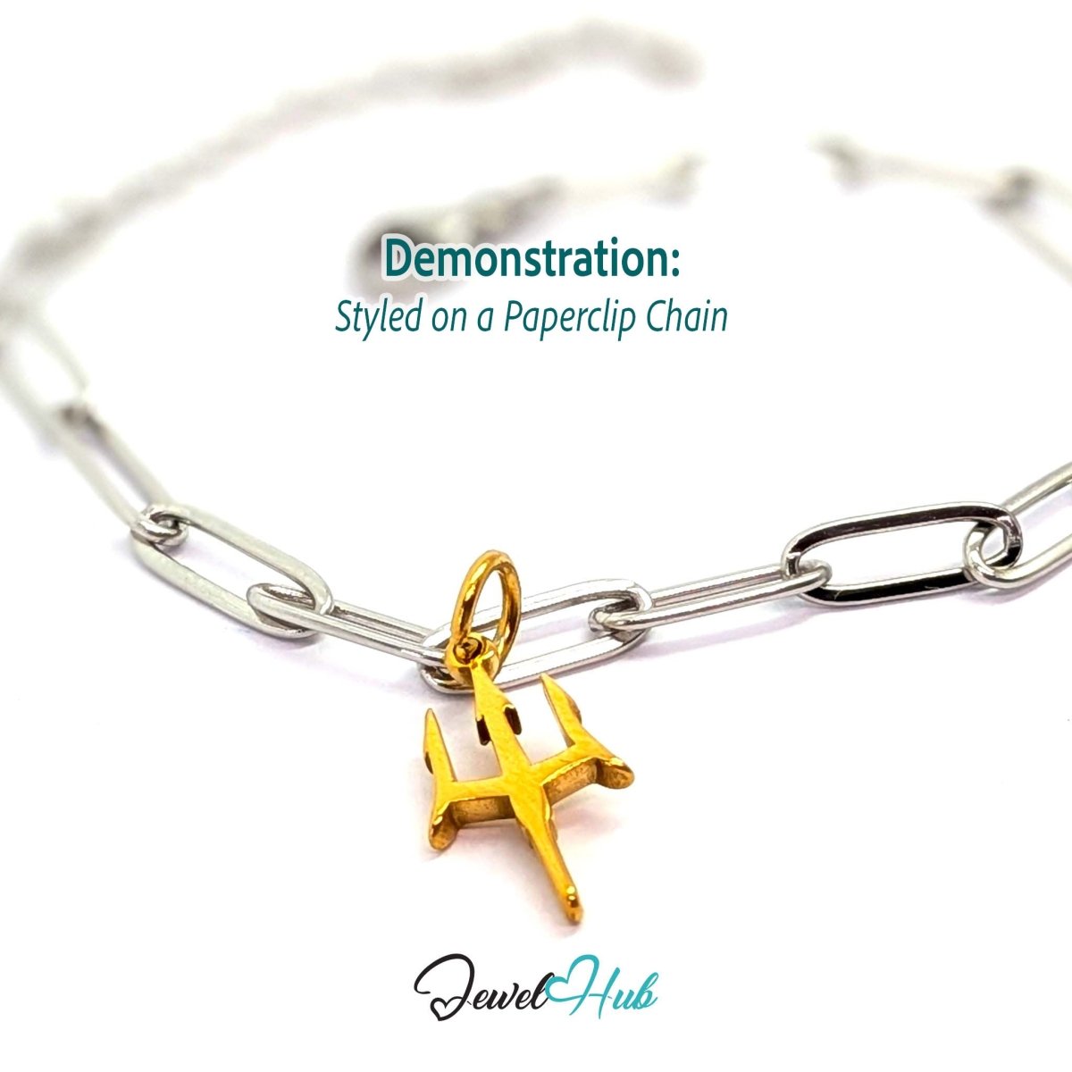 Trident charm in gold stainless steel - styled on a silver paperclip chain bracelet - JewelHub