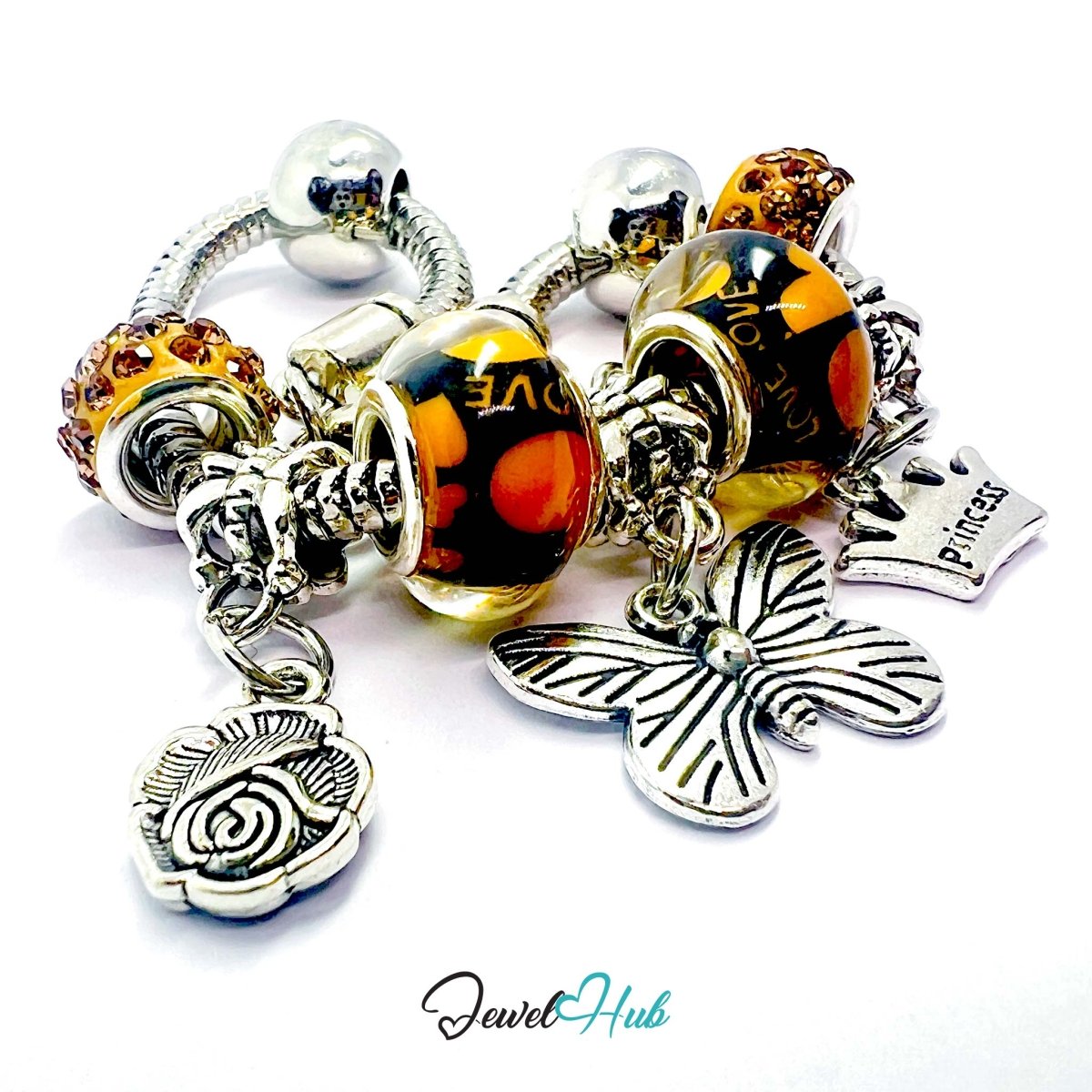 Zinc Alloy Amber Duo Bead Butterfly Rose Crown Charm Bracelet 18 - 22cm - JewelHub.co.uk