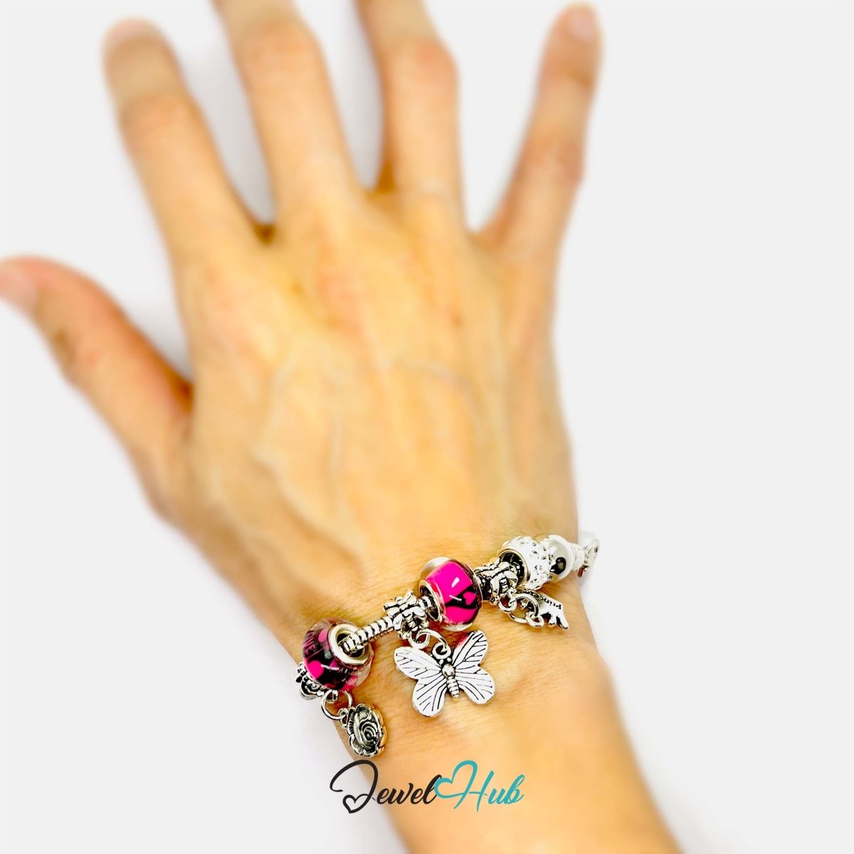 Zinc Alloy Pink Duo Bead Butterfly Rose Crown Charm Bracelet 18 - 22cm - JewelHub.co.uk