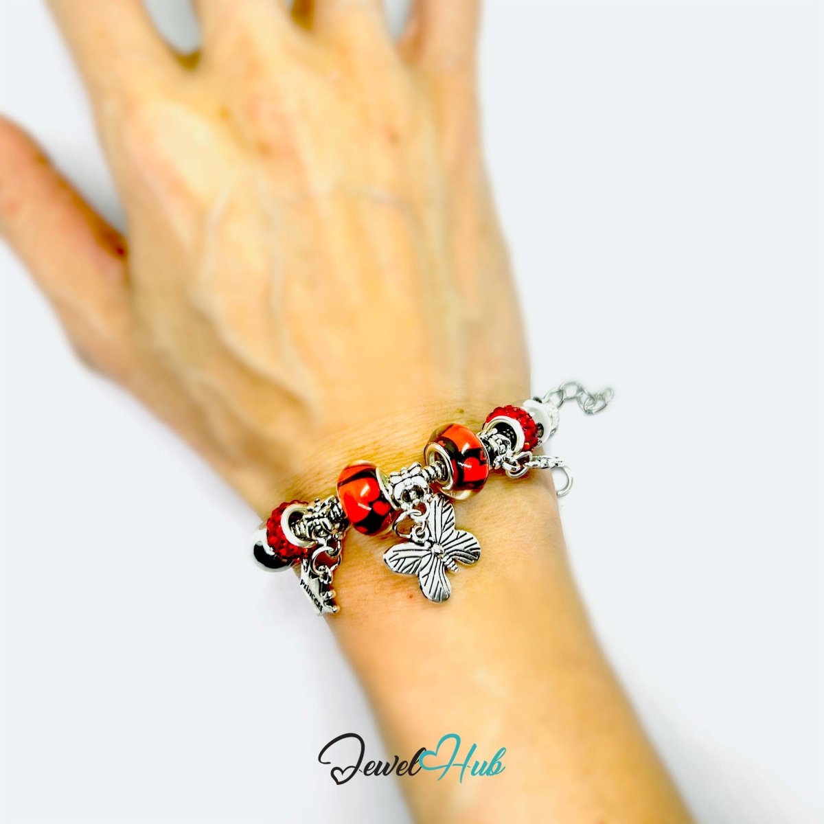 Zinc Alloy Red Duo Bead Butterfly Rose Crown Charm Bracelet 18 - 22cm - JewelHub.co.uk